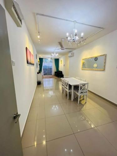a room with a white table and a white floor at Homestay King Putrajaya sebelah Alamanda in Putrajaya