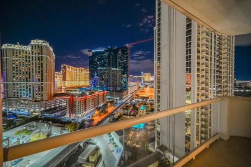 a view of a city at night from a building at MGM Signature Towers, Balcony Suite, Strip View - NO RESORT FEES! in Las Vegas