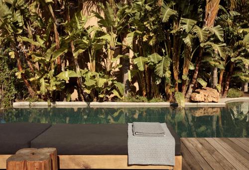 a swimming pool with a pool at F ZEEN Kefalonia in Lourdhata