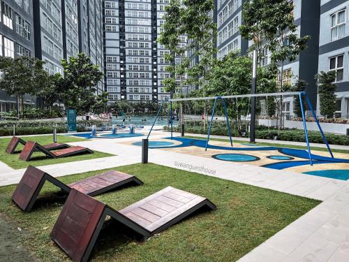 an empty playground with swings in a city at SUWAN Guesthouse A07 - 2BR Apartment with Free Wifi Near Kajang 2 in Kajang