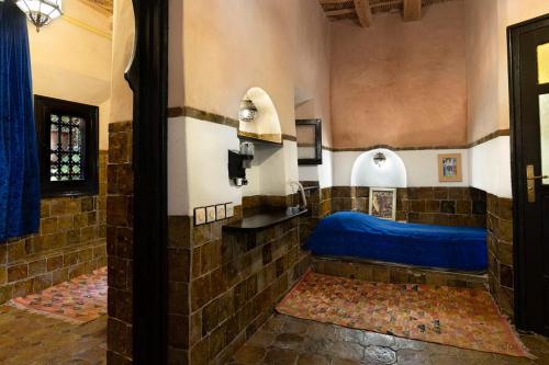Hôtel Riad Dar Daïfにあるベッド