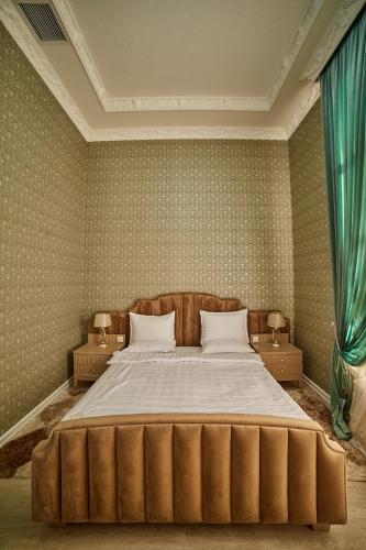 Ένα ή περισσότερα κρεβάτια σε δωμάτιο στο Comfort Hotel Samarkand