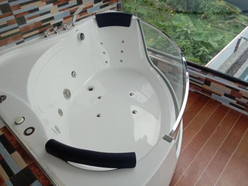 a boat with a glass floor on a balcony at A's Place - Your Private Resort! in Valencia