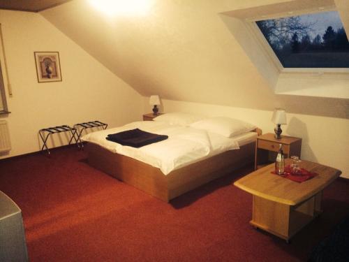 Postel nebo postele na pokoji v ubytování Hotel Friesenhof