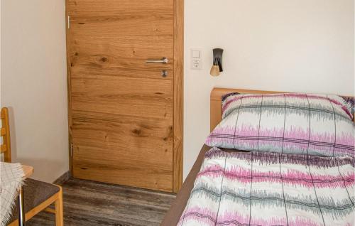 Säng eller sängar i ett rum på Karnische Alpen