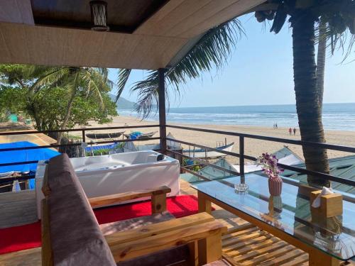 a bath tub sitting on top of a beach at Agonda Serenity Beach Villa in Agonda