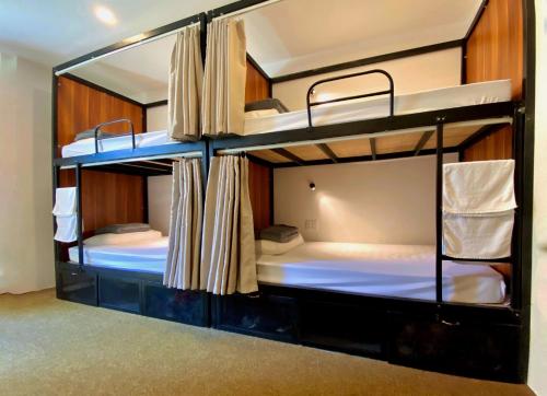 a couple of bunk beds in a room at Okra Hoian in Hoi An