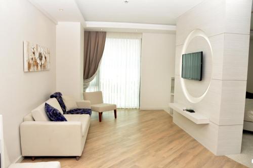 Ruang duduk di Grand Asya Hotel