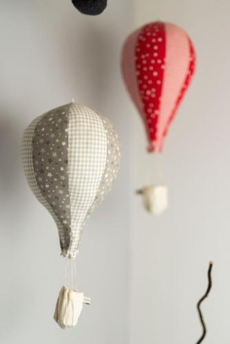 two hot air balloons hanging on a wall at Apartment Viksa with Jacuzzi in Zagreb