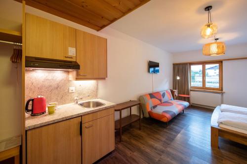 Køkken eller tekøkken på Sport-Lodge Klosters