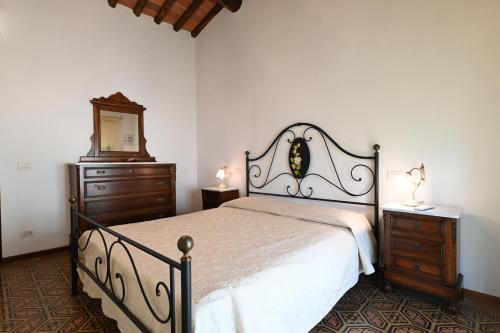 Posteľ alebo postele v izbe v ubytovaní Agriturismo Corte Stefani