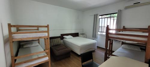 Postel nebo postele na pokoji v ubytování Hostel Rota do Vale