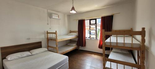 Postel nebo postele na pokoji v ubytování Hostel Rota do Vale