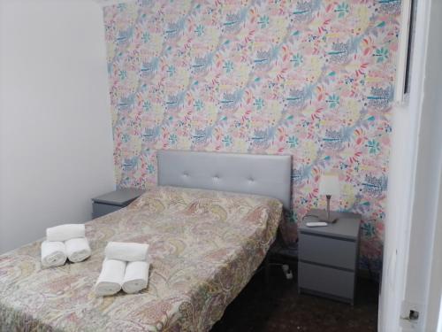 Postel nebo postele na pokoji v ubytování CENTER SEVILLA MAGDALENA PREMIUM, FREE Parking