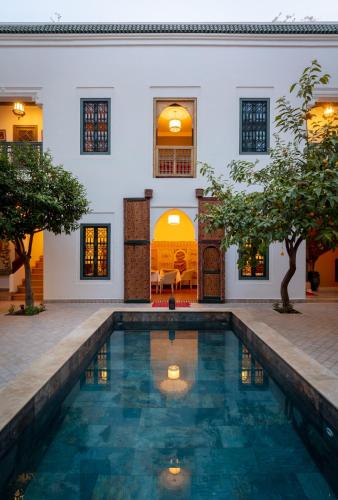 Bazén v ubytování Riad les remparts de la kasbah nebo v jeho okolí