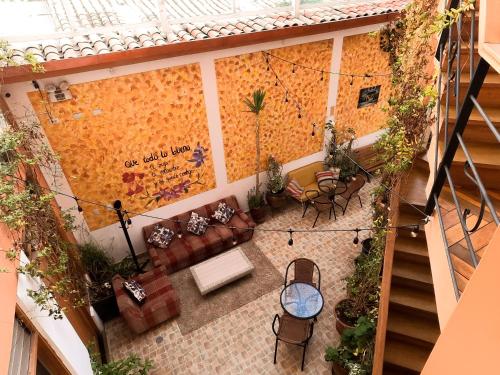 an overhead view of a patio with a table and chairs at Eco Bunnu Inn in Cusco