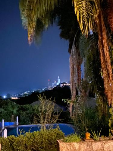 a view of the city from a hotel at night at Hotel Posada La Vereda in Cuetzalán del Progreso
