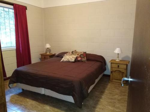 Postel nebo postele na pokoji v ubytování Cabañas La Herradura