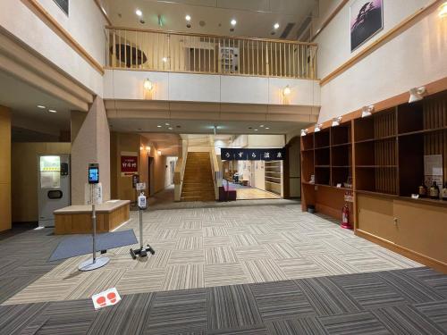 an empty lobby of a shopping mall at Assabu Uzura Onsen Shiki no Yado in Assabu