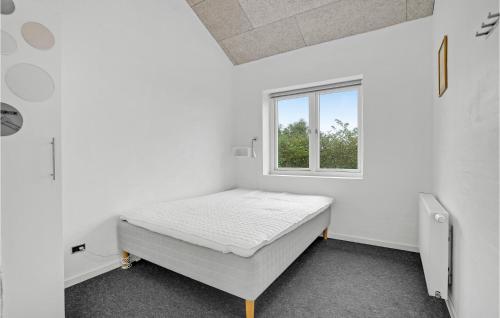Katil atau katil-katil dalam bilik di Nice Home In Tarm With Kitchen