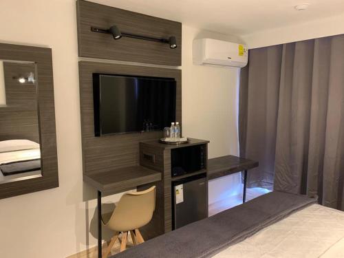 Ένα ή περισσότερα κρεβάτια σε δωμάτιο στο Hotel Princesa Plaza