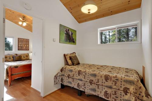 Postel nebo postele na pokoji v ubytování Silver Pines Lodge