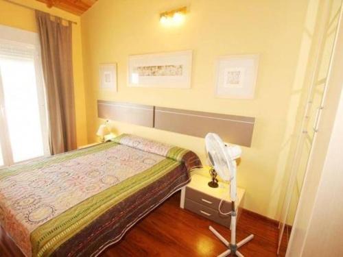 Posteľ alebo postele v izbe v ubytovaní Villa con piscina privada para 6 personas en Ametlla de Mar, a 4 km de la playa - HISP-217-32