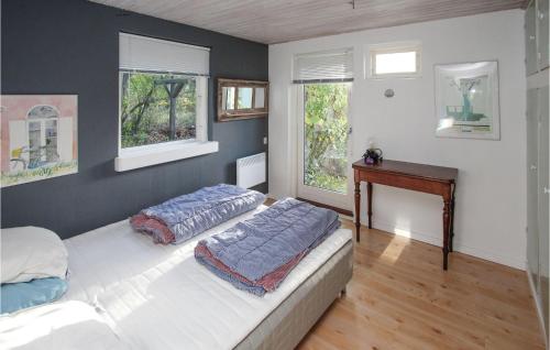Una cama o camas en una habitación de 2 Bedroom Awesome Home In Samsø