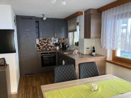 Kuchyň nebo kuchyňský kout v ubytování Haus Castello