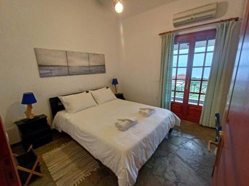 Postel nebo postele na pokoji v ubytování Villa Mariana