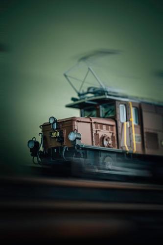 a train is sitting on the tracks at Stacja Szklarska Poręba - cisza i komfort in Szklarska Poręba