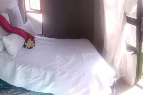 Łóżko lub łóżka w pokoju w obiekcie Located in the heart of the city