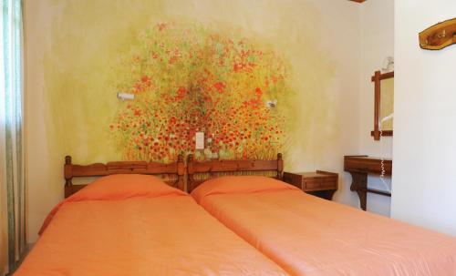 A bed or beds in a room at Pansion Matoula