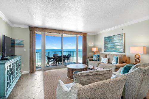 a living room with a view of the ocean at Perdido Towers East 1003 in Perdido Key
