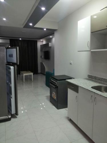 Una cocina o kitchenette en B