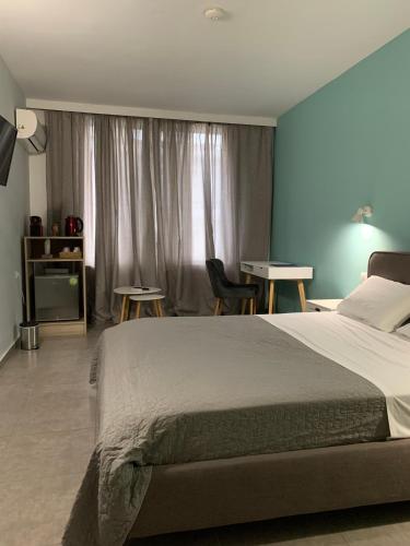 Katil atau katil-katil dalam bilik di Luxor Premium Suites
