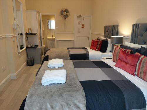 Cama o camas de una habitación en Prime Inn