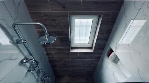 Kúpeľňa v ubytovaní Hodos Luxury APT near ATH-Airport