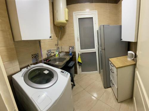 Kuchyň nebo kuchyňský kout v ubytování Your Comfortable Home