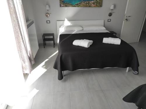 Ліжко або ліжка в номері Colline del sole