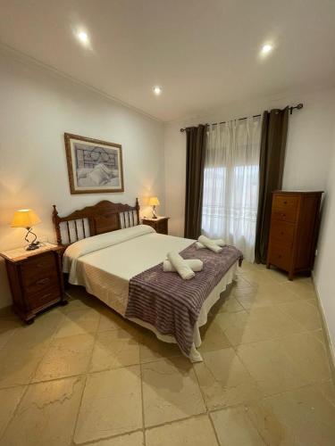 Ένα ή περισσότερα κρεβάτια σε δωμάτιο στο Casa Gonzalez