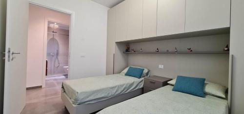 Ένα ή περισσότερα κρεβάτια σε δωμάτιο στο La Casa di Marco