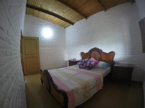 Een bed of bedden in een kamer bij Finca Hermosa Vista