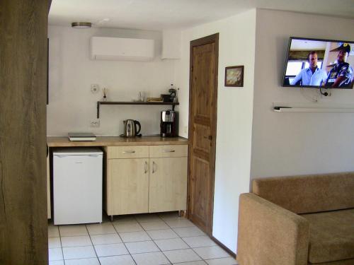 Dapur atau dapur kecil di Vila Junda