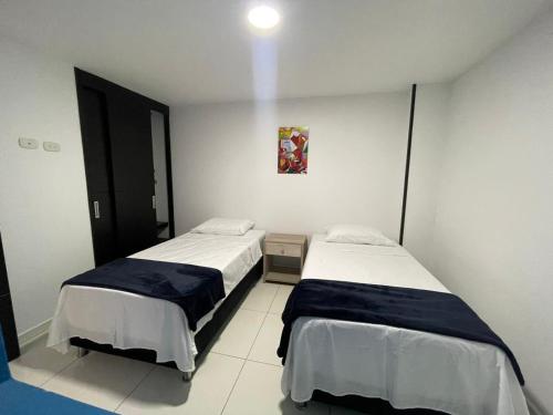 Postel nebo postele na pokoji v ubytování Hermoso apartamento en San Gil