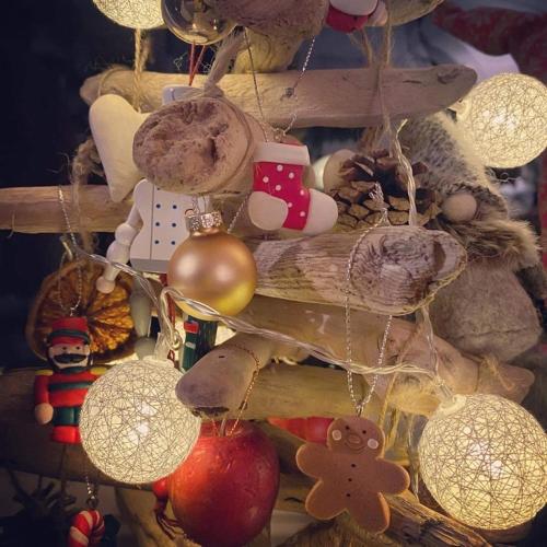 a group of christmas ornaments on a shelf at Bjørkli Lodge in Geilo