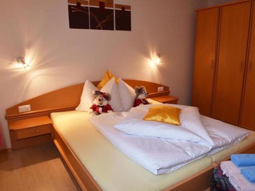 Postel nebo postele na pokoji v ubytování Nice apartment in Samnaun with garden