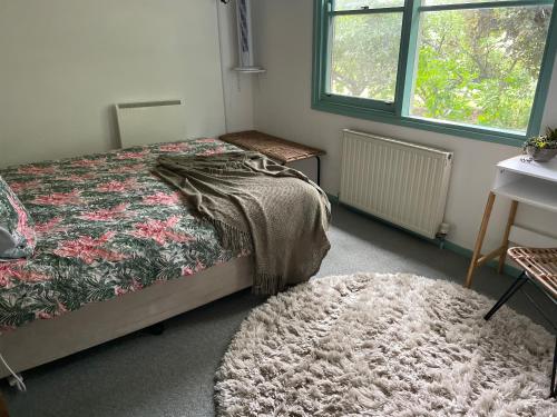 Ένα ή περισσότερα κρεβάτια σε δωμάτιο στο Butlers Guesthouse