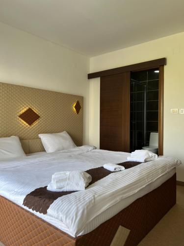 Postel nebo postele na pokoji v ubytování Hotel Andalus