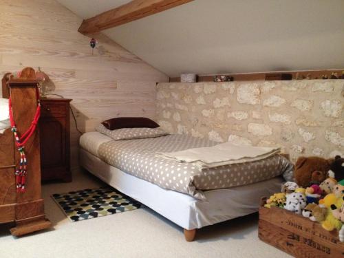 Tempat tidur dalam kamar di Chambres d'Hôtes Villa Gael